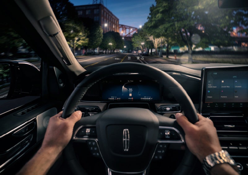The head-up display projects basic driver information onto the windshield above the steering wheel | Klaben Lincoln of Warren in Warren OH