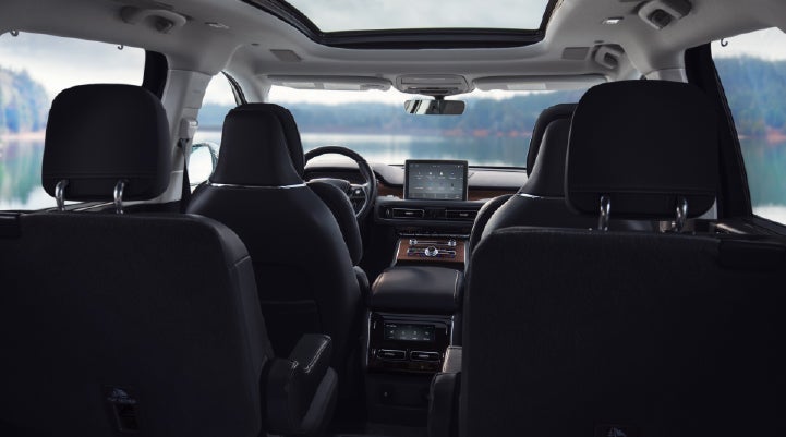 The interior of a 2024 Lincoln Aviator® SUV from behind the second row | Klaben Lincoln of Warren in Warren OH
