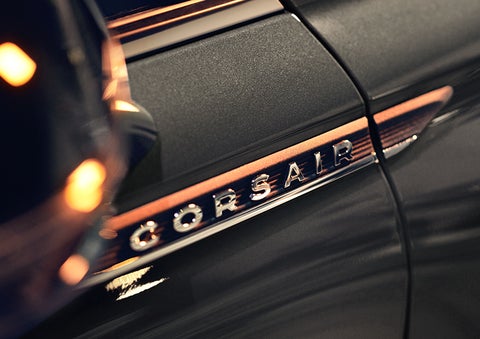 The stylish chrome badge reading “CORSAIR” is shown on the exterior of the vehicle. | Klaben Lincoln of Warren in Warren OH