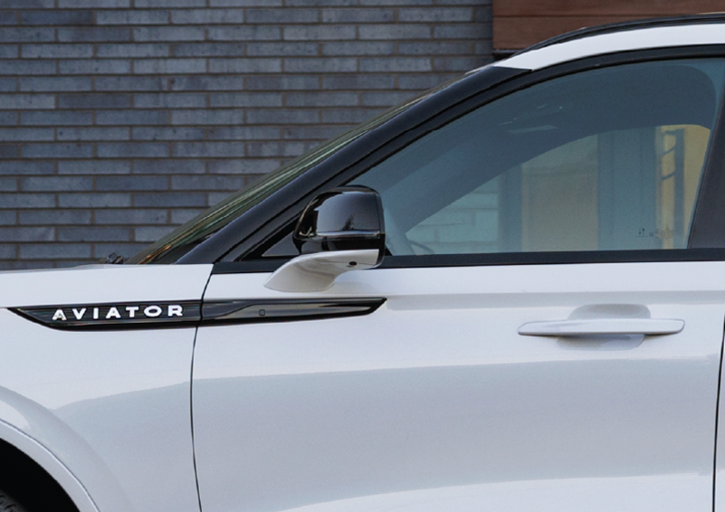 The driver’s door of a white 2025 Lincoln Aviator® SUV is showcased. | Klaben Lincoln of Warren in Warren OH