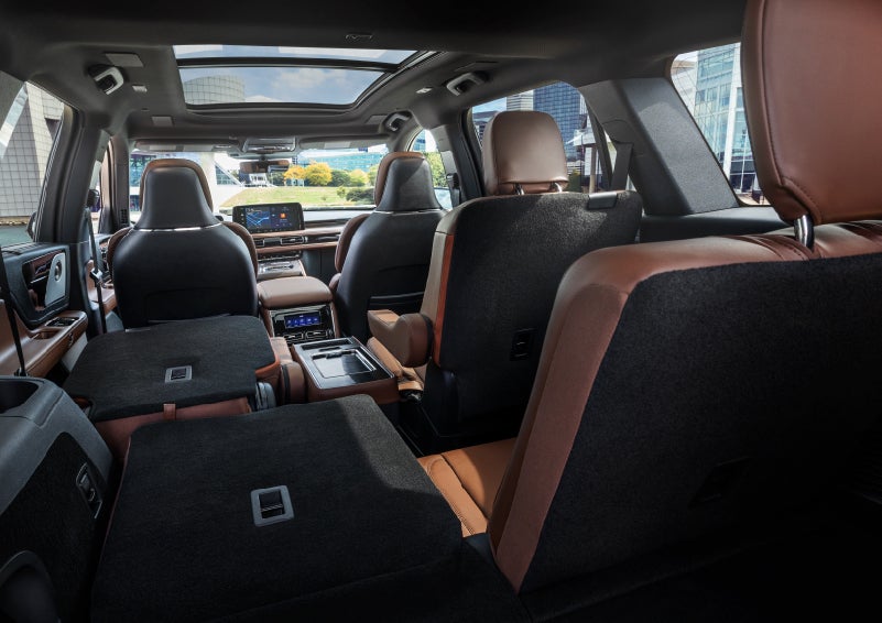 The interior of the 2025 Lincoln Aviator® SUV is shown with two seats folded down for added space. | Klaben Lincoln of Warren in Warren OH