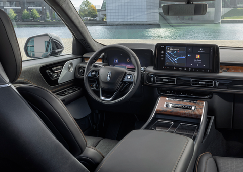 The interior of the 2025 Lincoln Aviator® SUV is shown parked with a view of a harbor through the windshield. | Klaben Lincoln of Warren in Warren OH