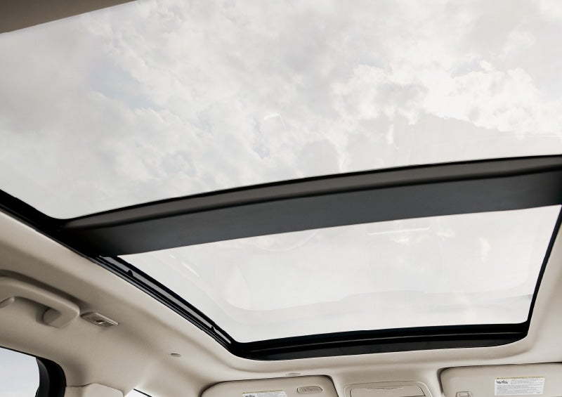 The available panoramic Vista Roof® is shown from the inside of a 2025 Lincoln Corsair® SUV.
