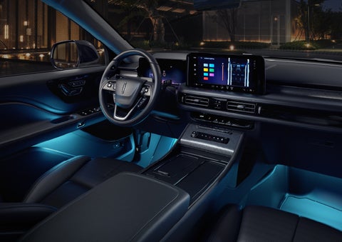 Deep blue Ambient Lighting glows from various places within a 2026 Lincoln Aviator® SUV. | Klaben Lincoln of Warren in Warren OH
