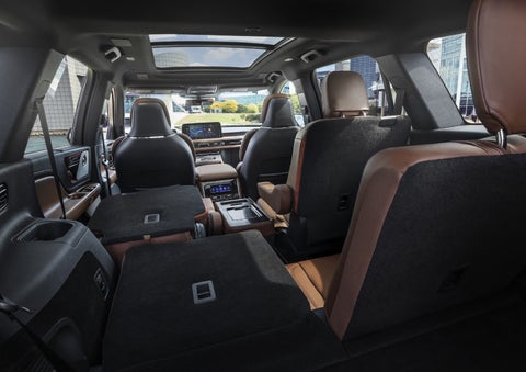 One side of the PowerFold® third-row seat and a second-row seat are folded forward in the 2026 Lincoln Aviator® SUV. | Klaben Lincoln of Warren in Warren OH