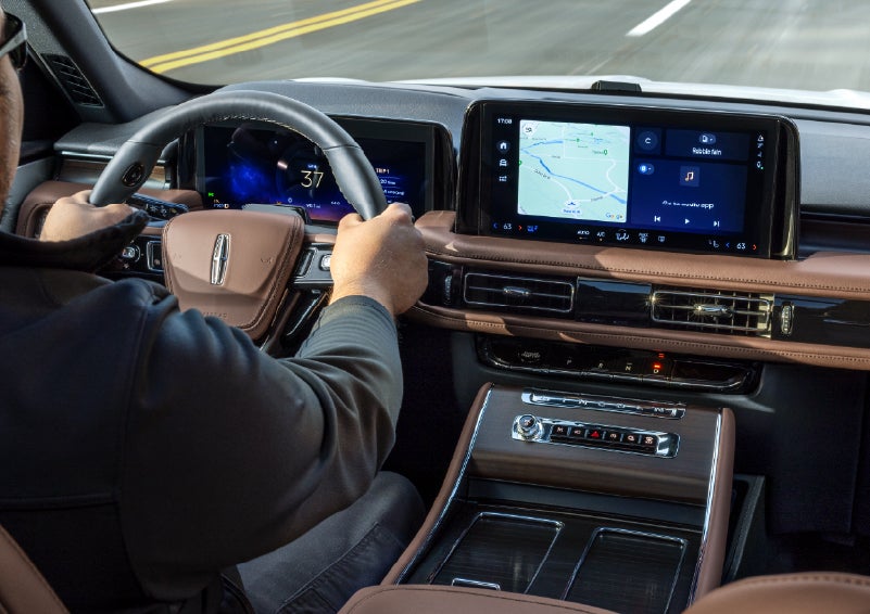 A person is driving a 2026 Lincoln Aviator® SUV as seen from inside the cabin. | Klaben Lincoln of Warren in Warren OH