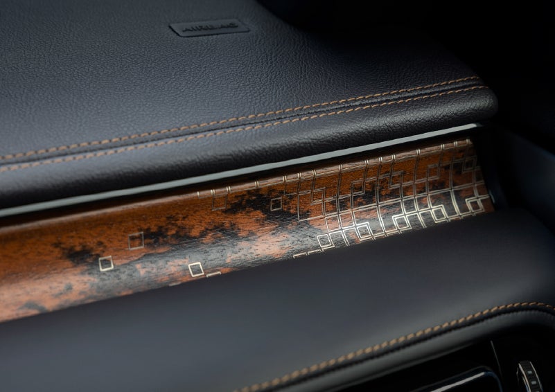 A close-up shot of the 2026 Lincoln Aviator® dashboard with unique black and brown accents and brown stitching. | Klaben Lincoln of Warren in Warren OH