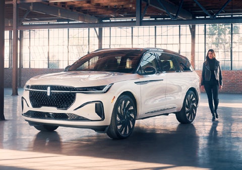 A person approaches a 2026 Lincoln Nautilus® SUV. | Klaben Lincoln of Warren in Warren OH