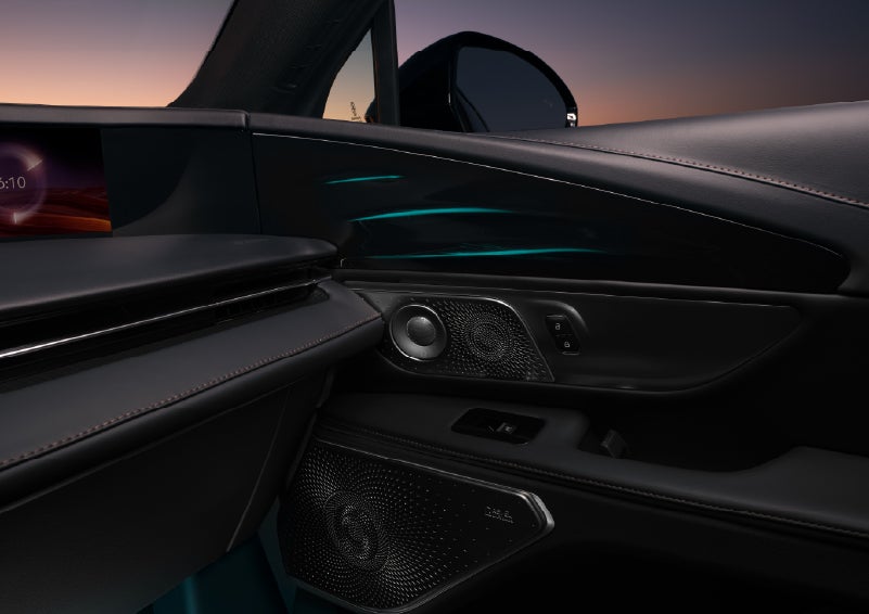 Selectable ambient lighting glows in the passenger door panel. | Klaben Lincoln of Warren in Warren OH