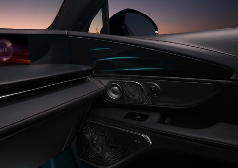 Selectable ambient lighting glows in the passenger door panel. | Klaben Lincoln of Warren in Warren OH