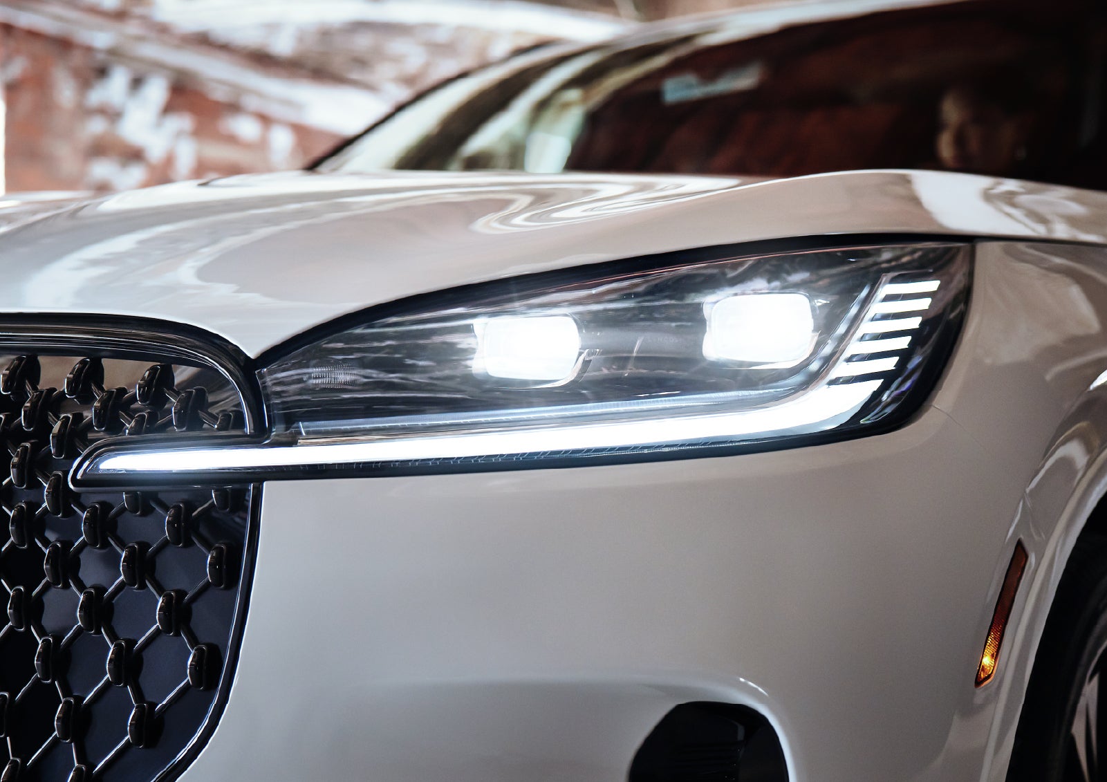 A close-up of a headlamp on the 2027 Lincoln Aviator® SUV is shown. | Klaben Lincoln of Warren in Warren OH